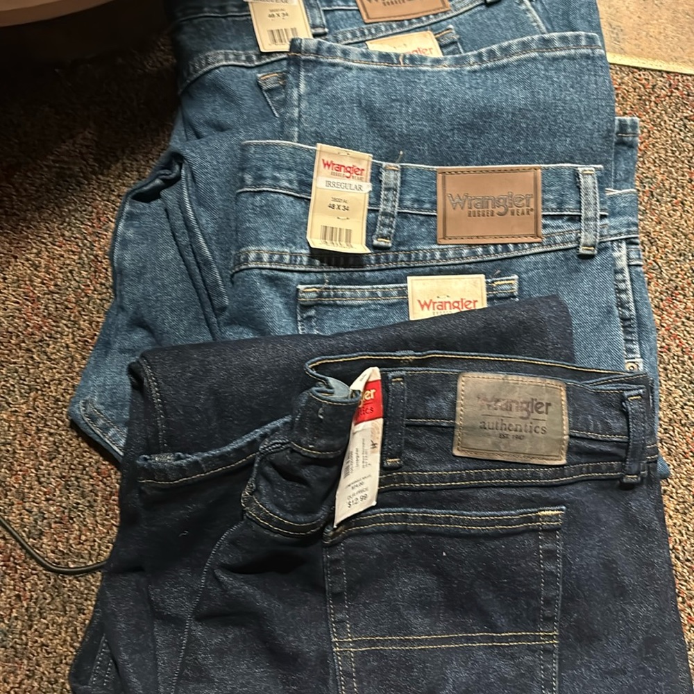 Brand new Wrangler relaxed fit jeans .. 48x34 your choice of dark denim or light